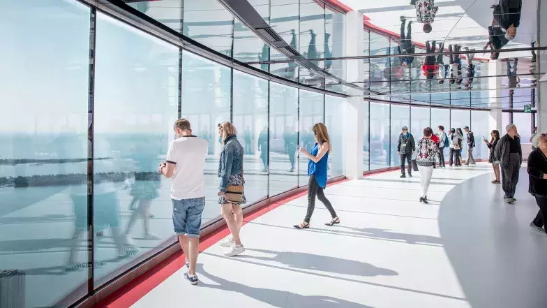 People by the glass window